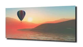 obraz na szkle Balon lecący nad morzem
