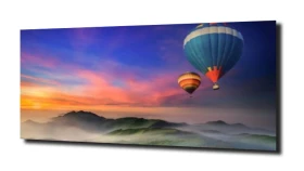 obraz na szkle Balony pod kolorowym niebem